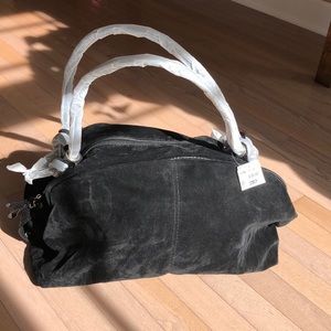 Black super cute and spacious bag!